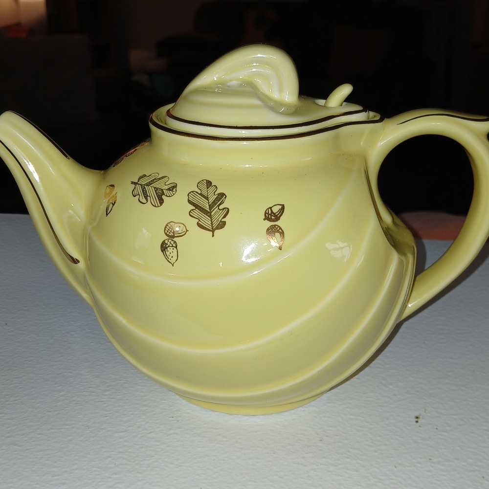 Yellow Ceramic Teapot with Gold Accents